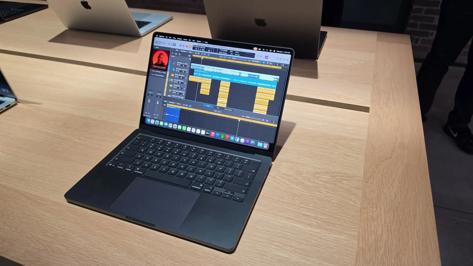 m5 macbook pro on display with music editing software on screen