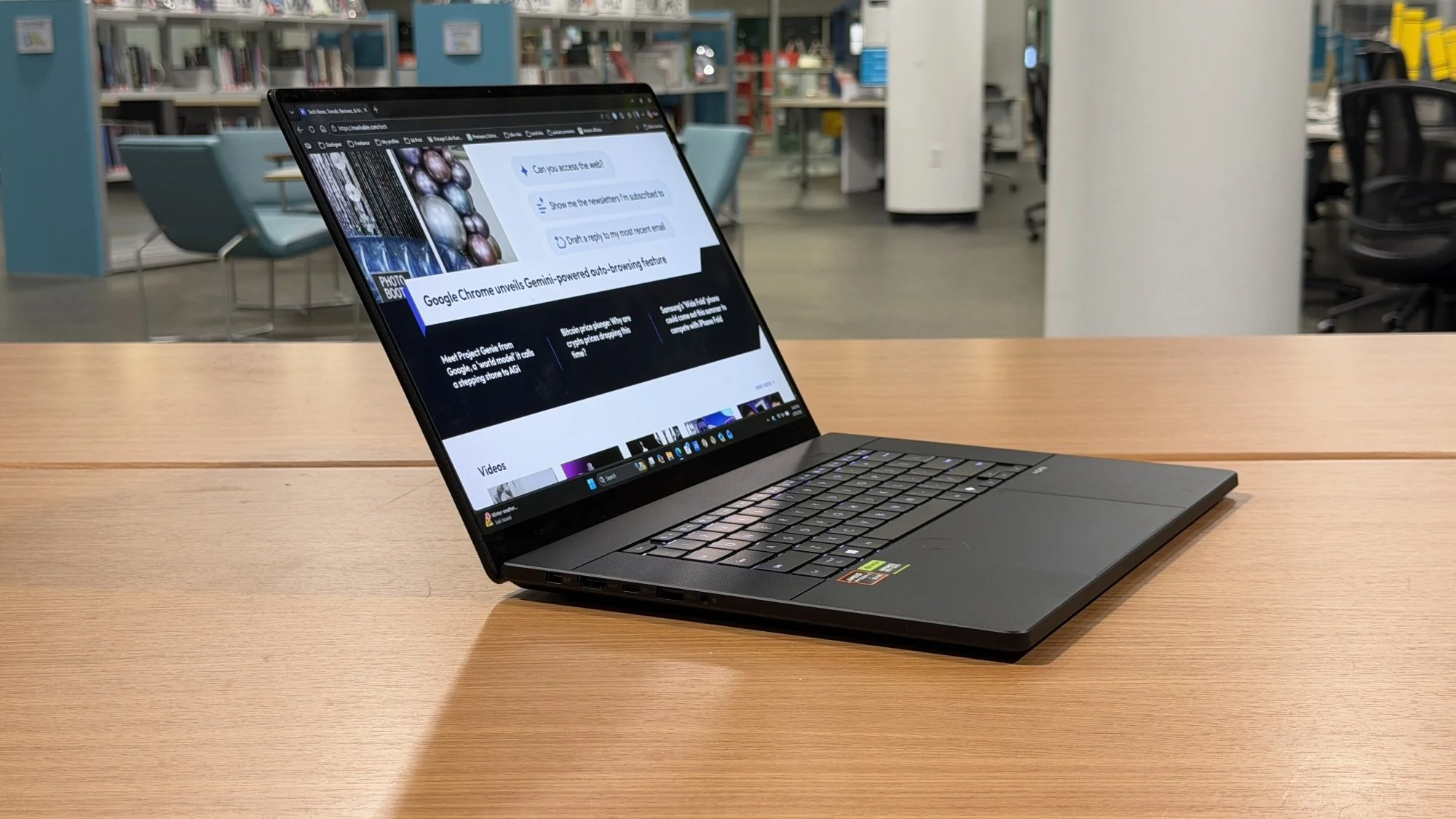 Asus ProArt P16 laptop on library table