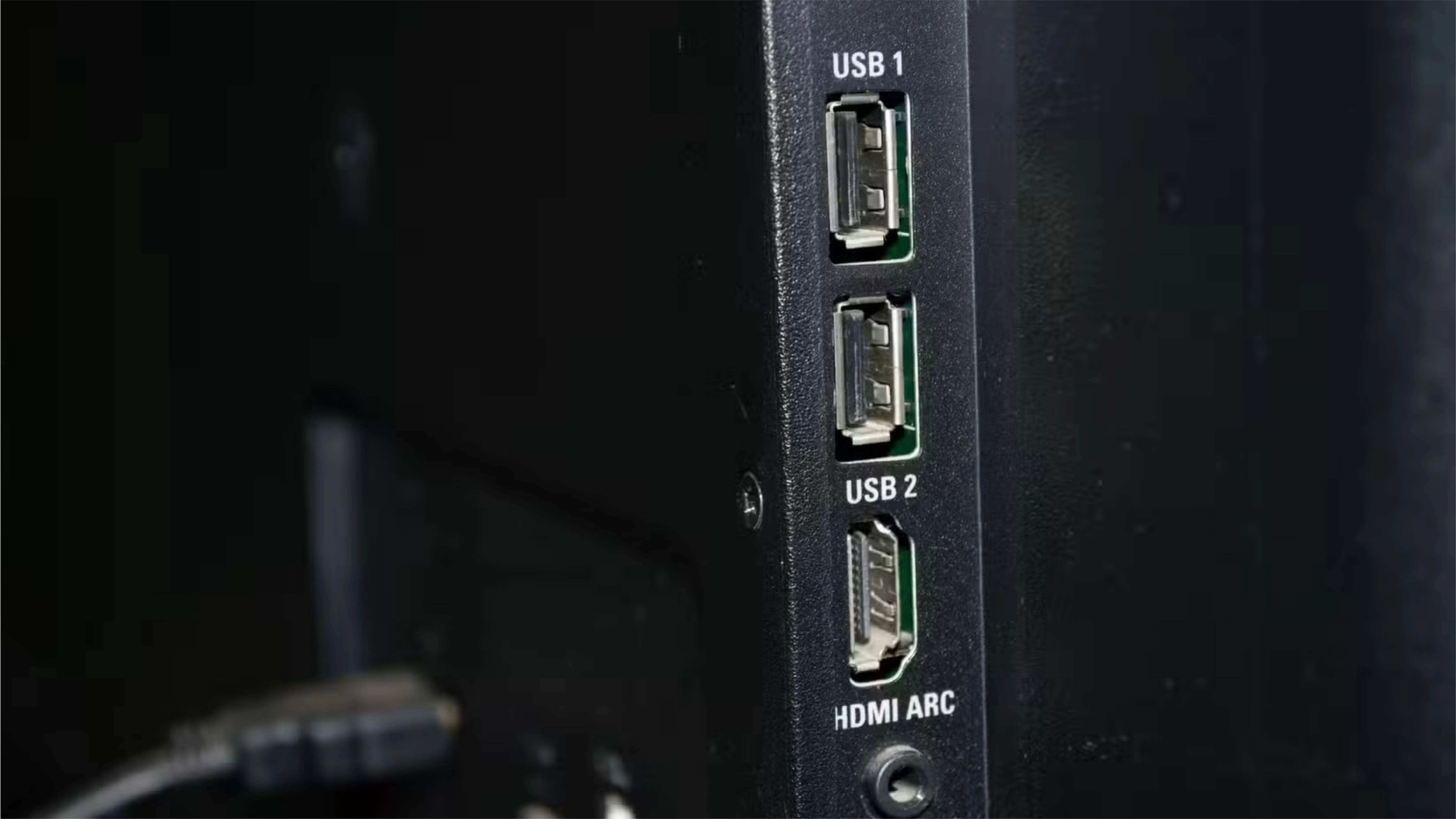 USB ports on the side of a TV on top of an HDMI port.